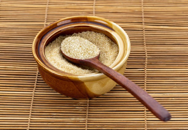 istock One spoon of brown sugar placed on a ceramic cup. 2202641301