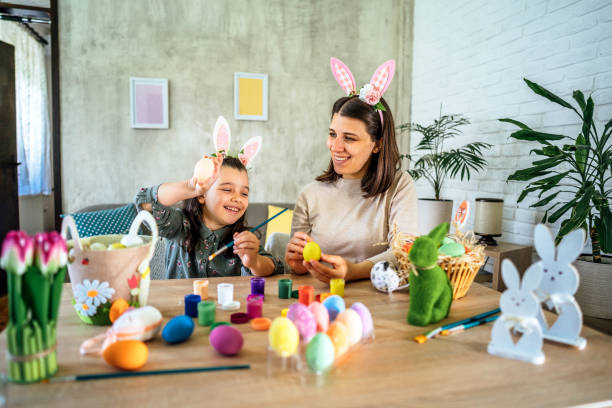 istock Mother and daughter enjoying Easter preparations 2202641325