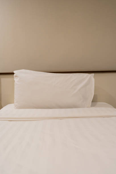 istock Pillows on bed in bedroom 2202641669