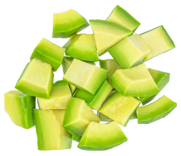 istock peeled avocado cubes. Avocado slices isolated on white background 2202654518