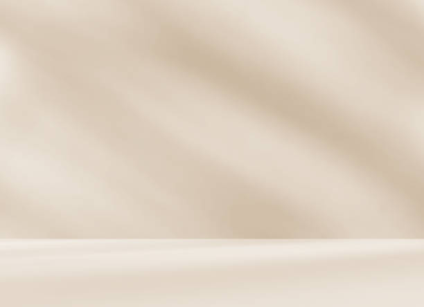 istock Empty cream beige brown room studio with shadow of leaves for product presentation. 2202662690