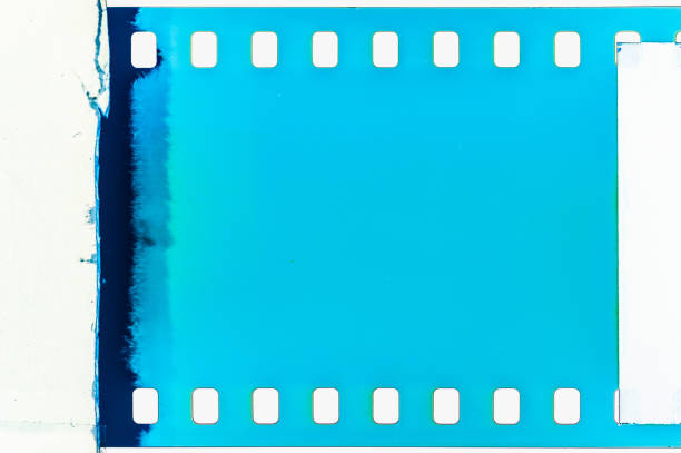 Old grunge filmstrip, blue 35mm film reel