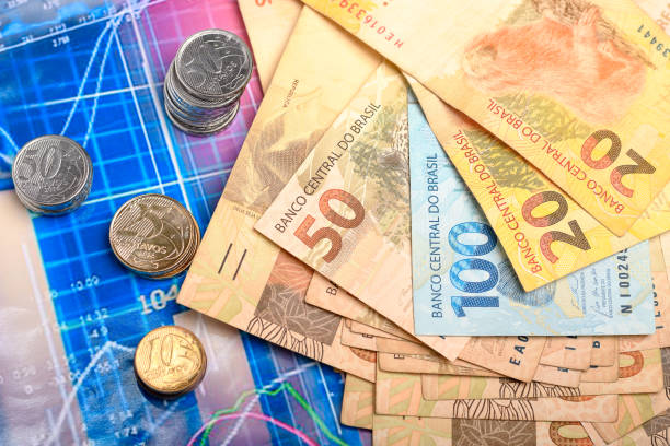 istock Brazilian Real Currency and Financial Chart 2202669250