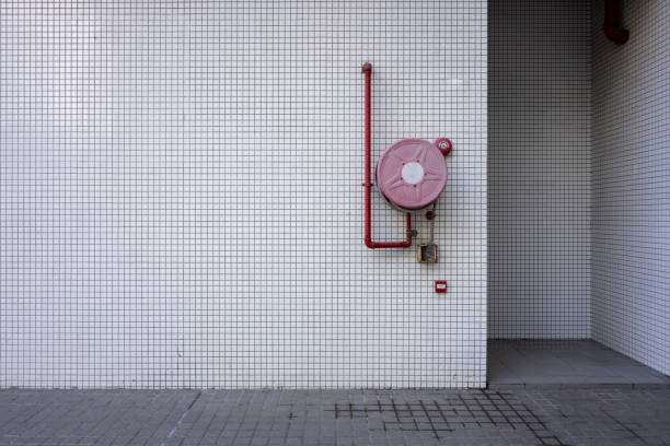 Fire sprinkler system for train station in Jakarta City, Indonesia, installed vertically near sidewalks