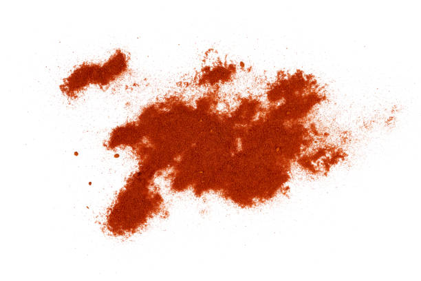 istock red paprika powder pile top view isolated on white 2202676174