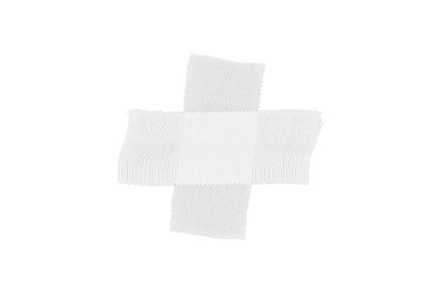 Adhesive bandages on purple background