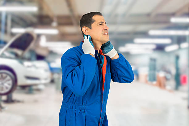 istock mechanic experiencing discomfort in his neck 2202678405