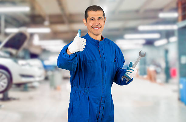 istock Mechanic posing with a wrench 2202678493