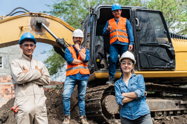 istock Portrait of engineers and employees at a construction site 2202680412