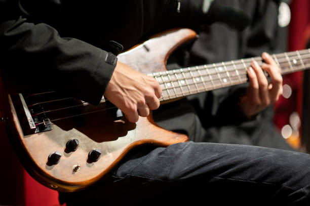 istock Bass Guitarist in Action 2202683794