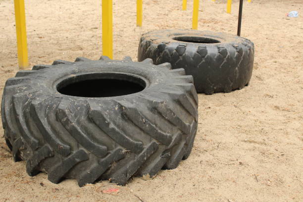 Car tires are lying on the ground. Resource reuse.