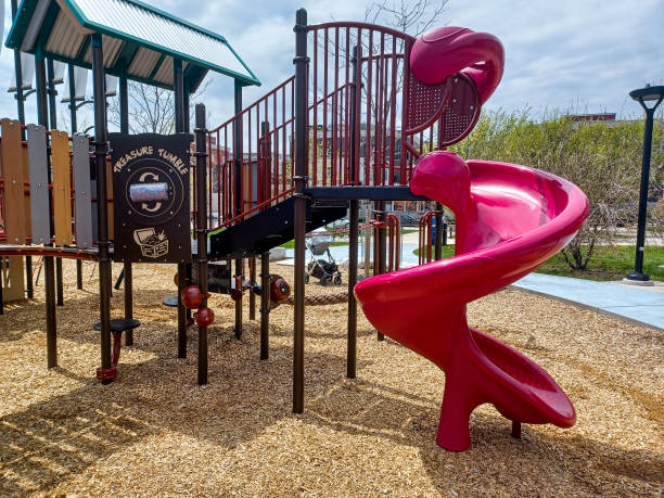 istock Child playground in sunny day 2202690410