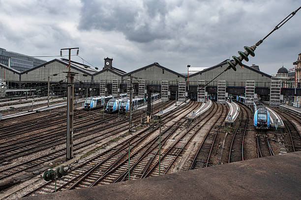 Gare Saint Lazare in Paris, France, with trains parked on the platform rails