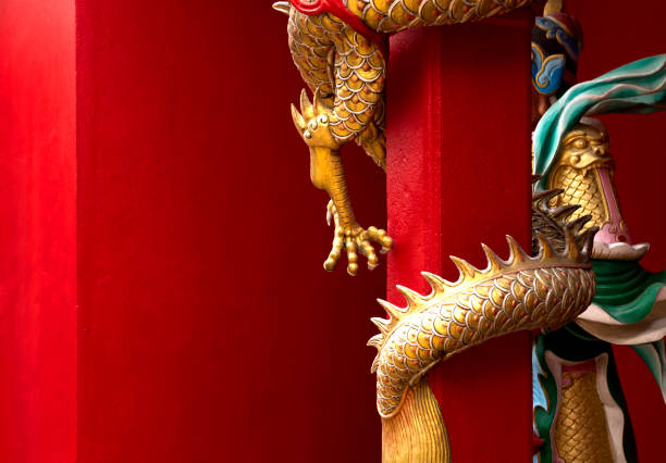 istock golden dragon surrounds the red column 2202697057