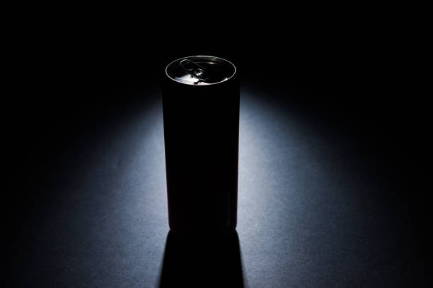 soda can in low-key lighting with spotlight