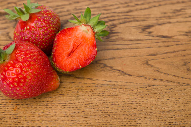 strawberry on wooden table, copy space, top view