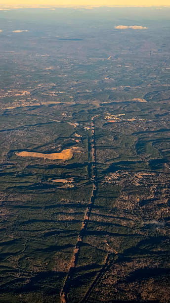 istock Looking out of an Airplane Window at Sunset while in Flight, Taking Off from Birmingham, Alabama 2202703390