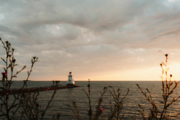 A scenic shot of a lighthouse during sunset. Shallow depth of field. Shot with a Canon 5D Mark IV.