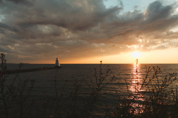 A scenic shot of a lighthouse during sunset. Shallow depth of field. Shot with a Canon 5D Mark IV.