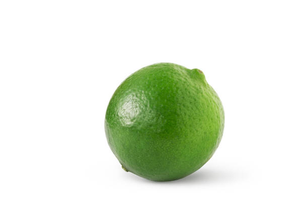 istock Fresh whole green lime fruit isolated 2202720299
