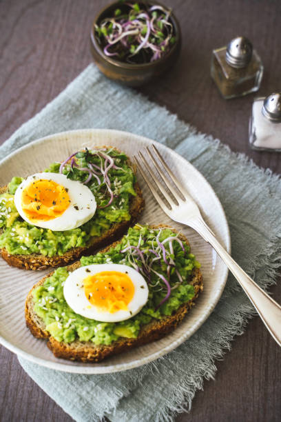 istock Savory Avocado Toast with Boiled Eggs Delight 2202730628