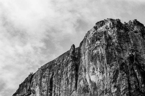 Low angle view of Lost Arrow Spire, a detached pillar in Yosemite Valley, located immediately adjacent to Upper Yosemite Falls.\n\nTaken in Yosemite National Park, California, USA
