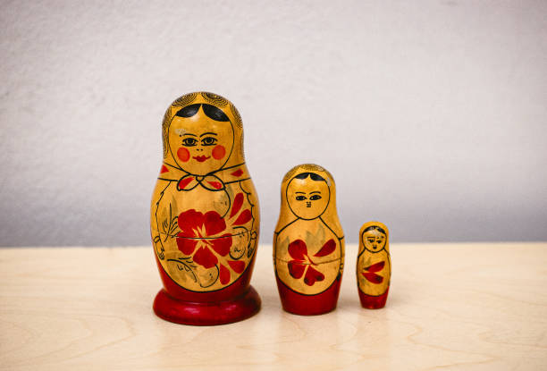 istock Traditional Russian nesting dolls arranged in a display, showcasing intricate details and vibrant colors in a cozy setting 2202735073