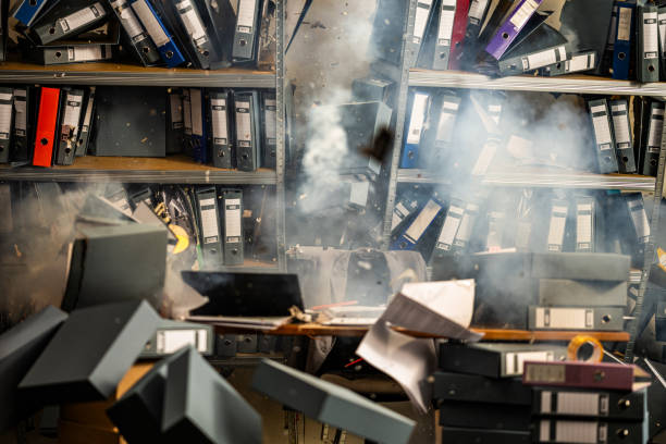 istock Explosive Chaos in Office with Shattered Binders 2202739550