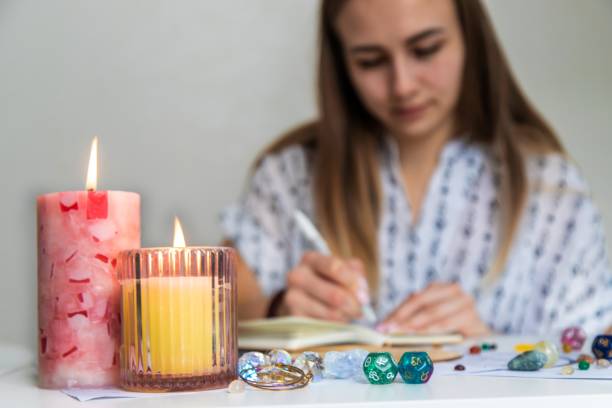 istock Woman astrologer draws a natal chart. Selective focus 2202748944
