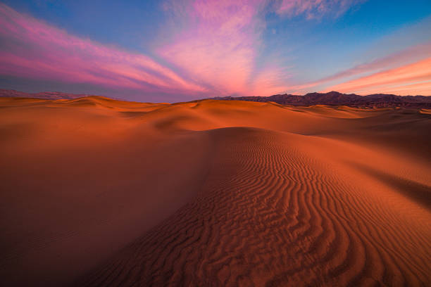 istock Painted Skies Over Mesquite Dunes 2202757974