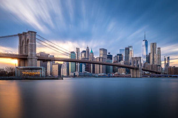 A daytime long exposure of The Brooklyn Bridge and Lower Manhattan