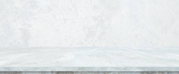 istock Empty white marble table over white cement wall background, White shelf, counter for food and product display montage backdrop, Table top, desk surface banner, mockup, template 2202759869