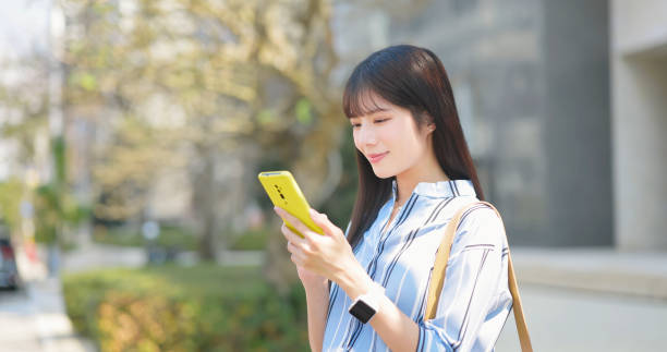 istock businesswoman check cellular info 2202768400