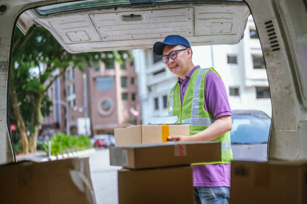 istock Efficient Delivery: Unloading Parcels in the City 2202769806