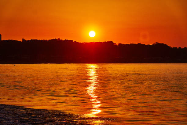 sunbeam, lens flare, orange color