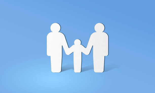 istock Minimalist paper-cut family symbol on a blue background 2202772995