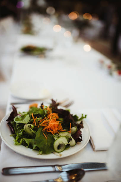 istock Side view of side salad on table at wedding reception 2202773174