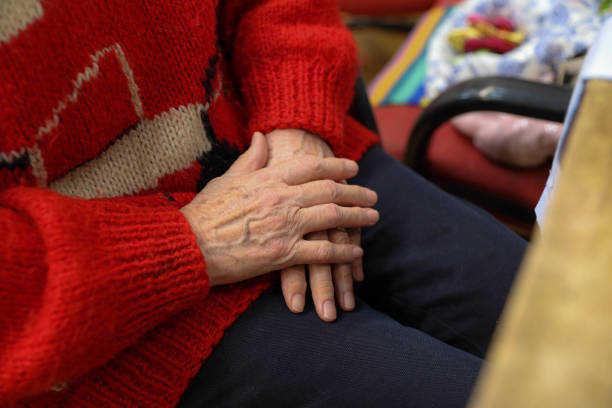 istock Closeup of elderly hands 2202776519