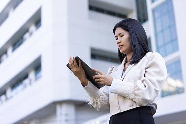 istock Future remote work combines technology smart phone connection online white digital business woman enable e-learning productivity while travel blend comfort modern devices serenity computer equipment 2202783117