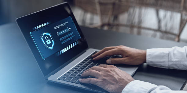 istock Cybersecurity login screen on a laptop with hands typing. 2202783754