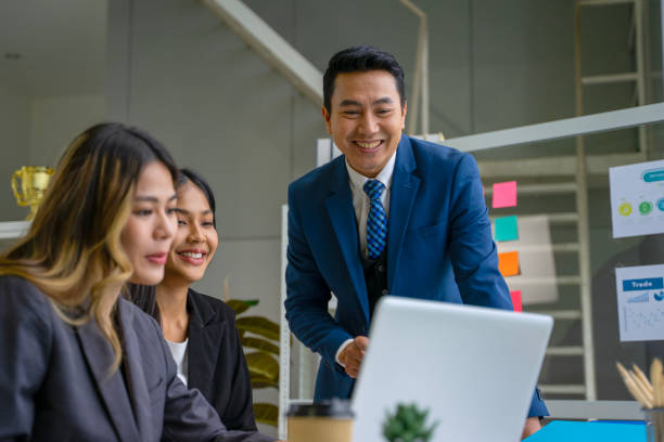 istock White collar workers are working with team at office. 2202786347