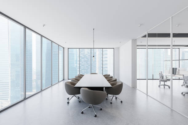 istock Modern office conference room with a long table and chairs in a glass-walled open space. 3D Rendering 2202786610