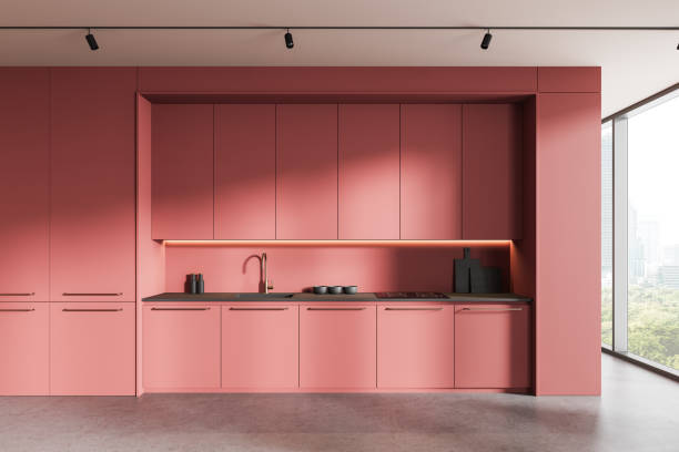 istock Modern pink kitchen interior with sleek cabinetry and city view. 3D Rendering 2202786623