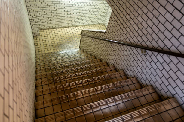 istock Tiled staircase, passageway leading to basement 2202787302