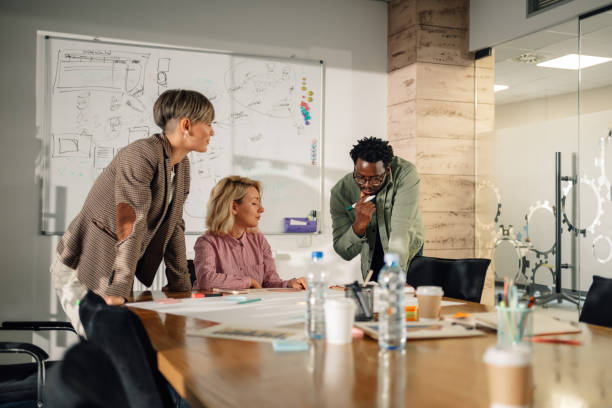 istock Creative business team brainstorming during meeting in modern office 2202789124