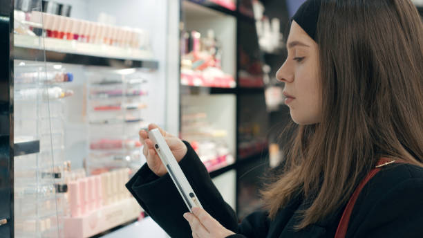 istock Customer looking at a product in a store 2202794684