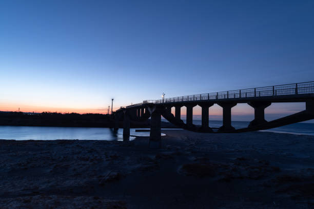 istock Beautiful sky and silhouette of a bridge before dawn 2202795989