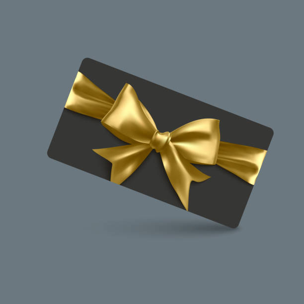 istock Golden voucher or gift card, gold certificate for discount. Set of isolated template for present coupon with ribbon and bow 2202796540