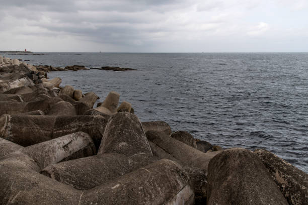 istock tetrapods and sea on a cloudy day 2202797320