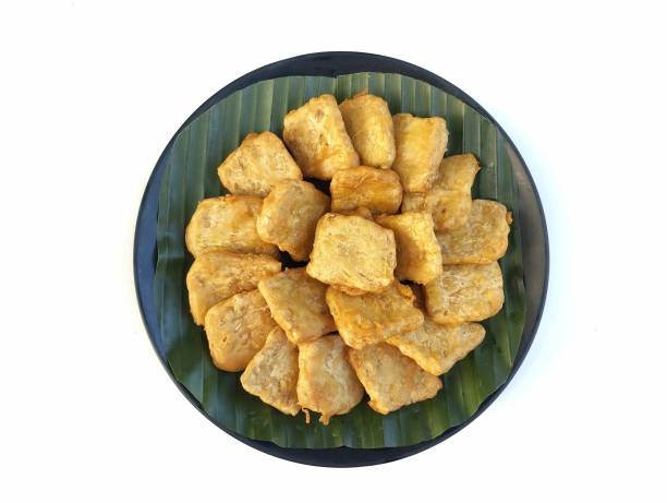 istock Goreng tempe or fried Tempeh on plate isolated on white background 2202798547